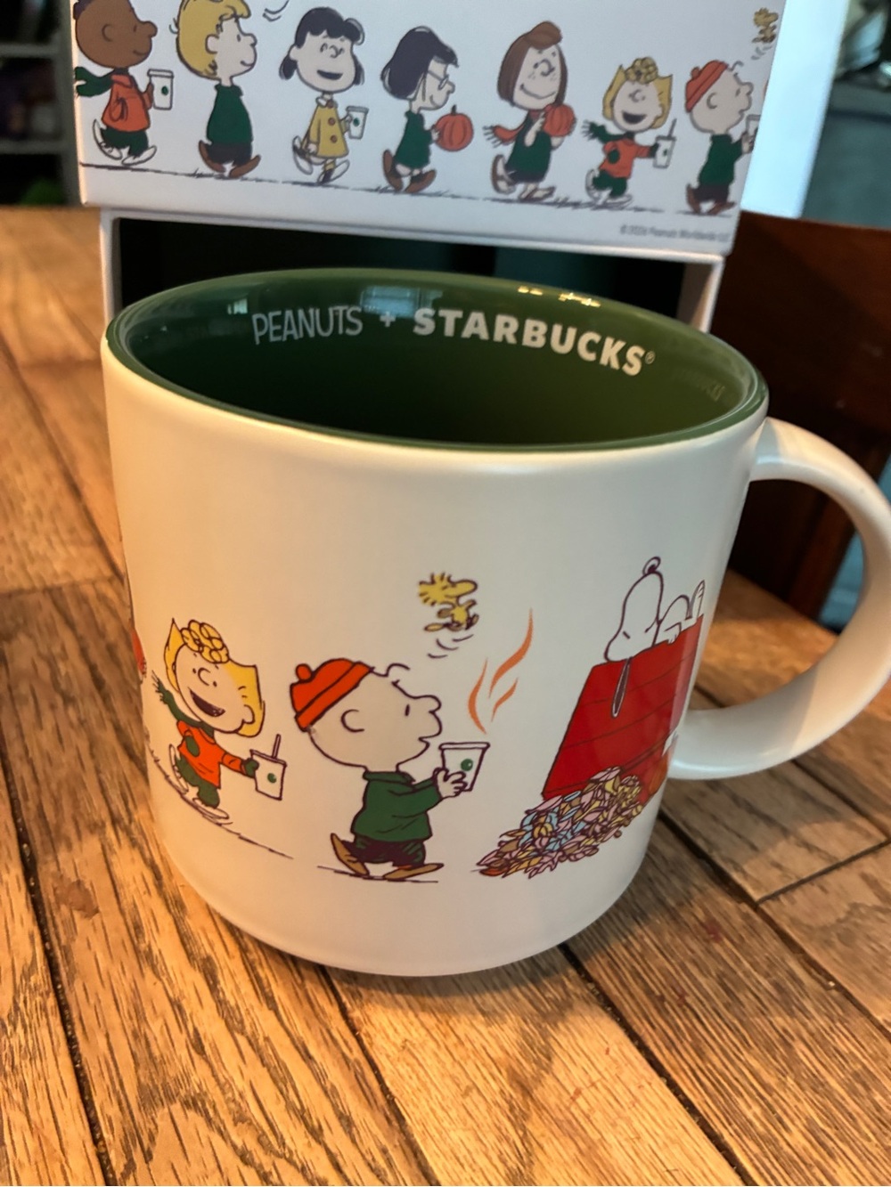 Starbucks Peanuts Holiday Cream Mug with Green Interior